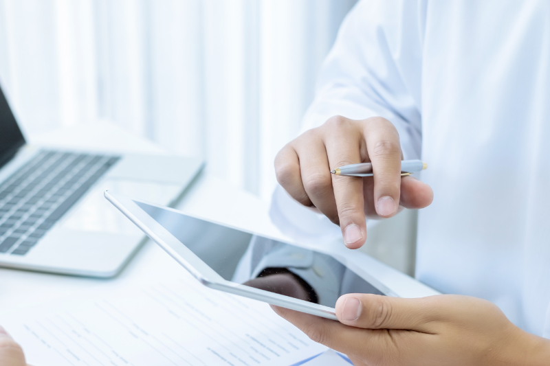 Clinician using smart tablet